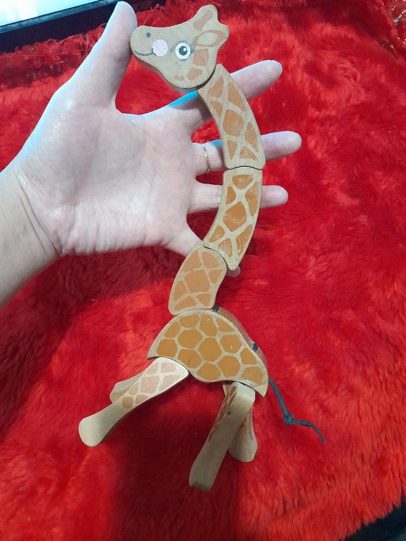 Melissa and doug giraffe grasping toy deals