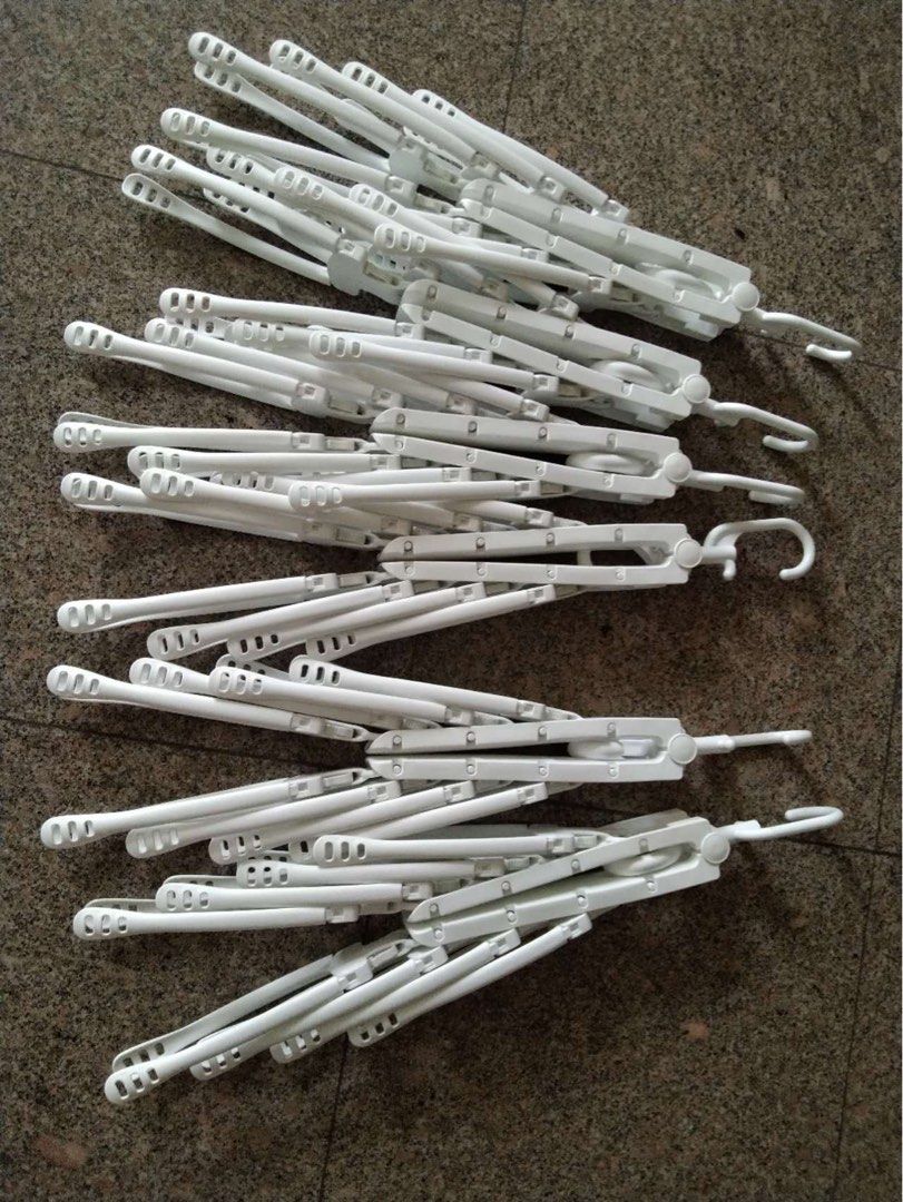 multi function hanger (Category: Hooks & Hangers) located in Singapore. Submitted by su_shanshan (Listing ID 1226717321, Image 1). Description: 5 for $15.