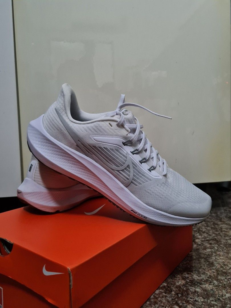 Nike zoom fly triple white hot sale