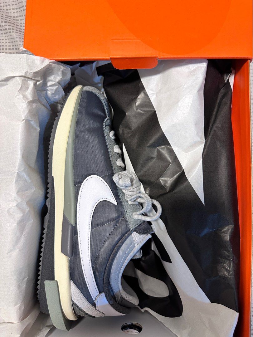 grey and white nike cortez