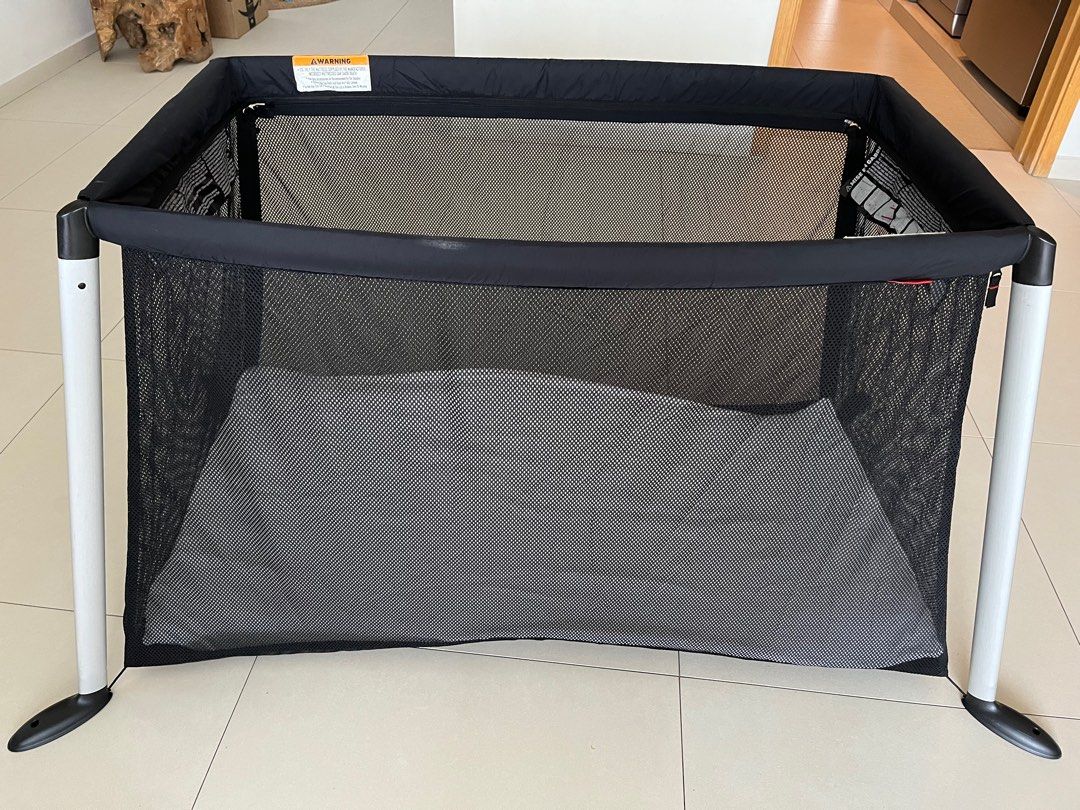 Phil and top teds travel cot