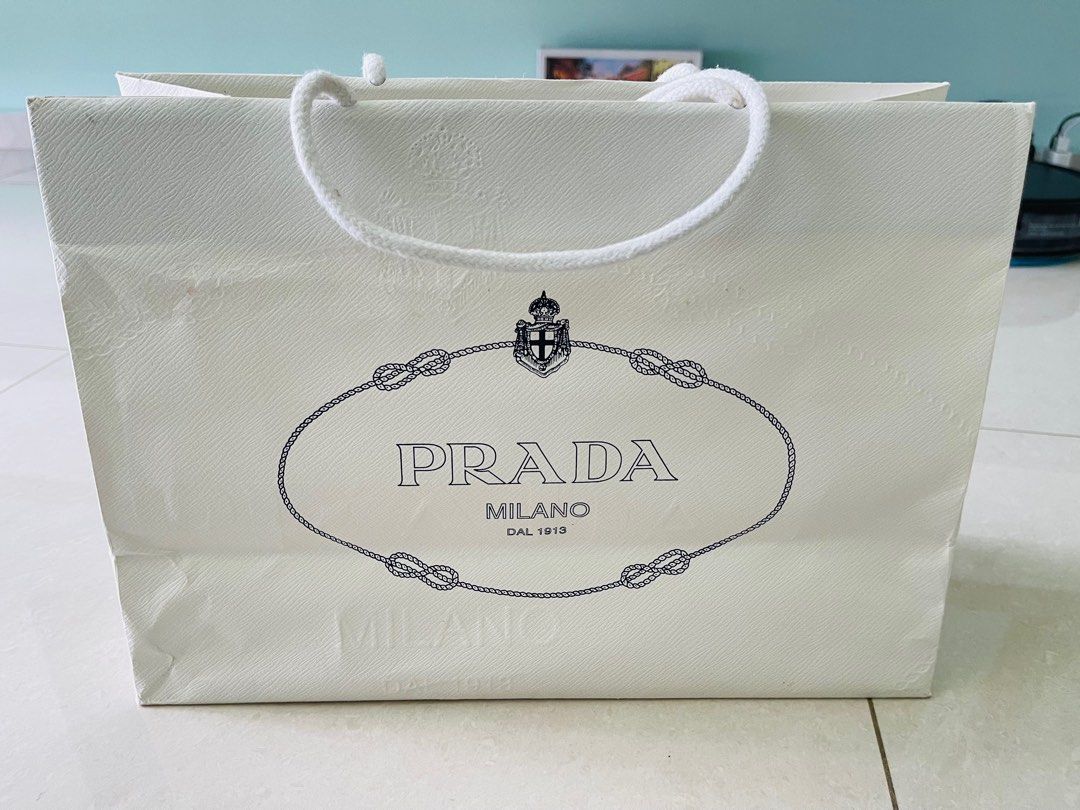 Prada white paper bag, Luxury, Bags & Wallets on Carousell