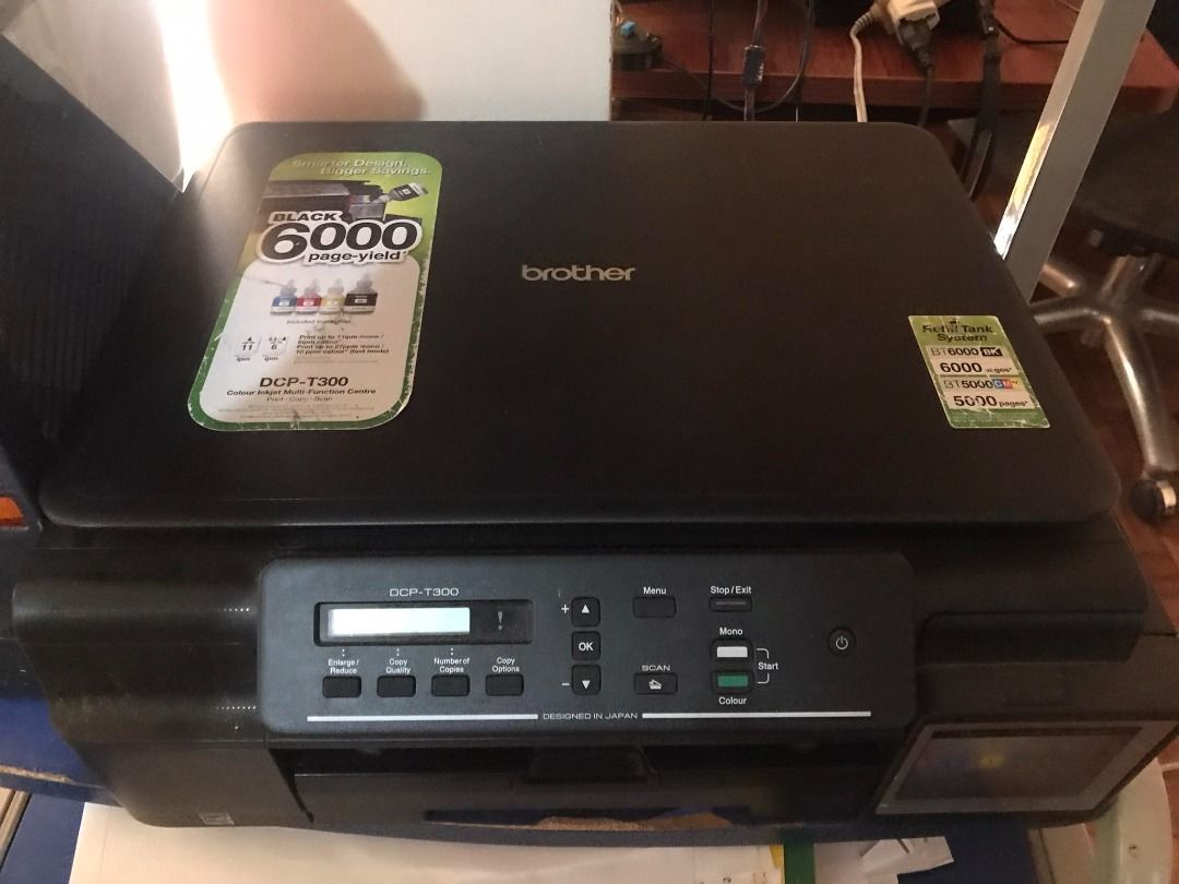 Printer Brother model DCPT300 and computer table (made of metal) for