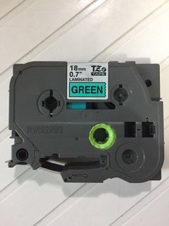 18mm x 8m Label Maker Green tape and black text