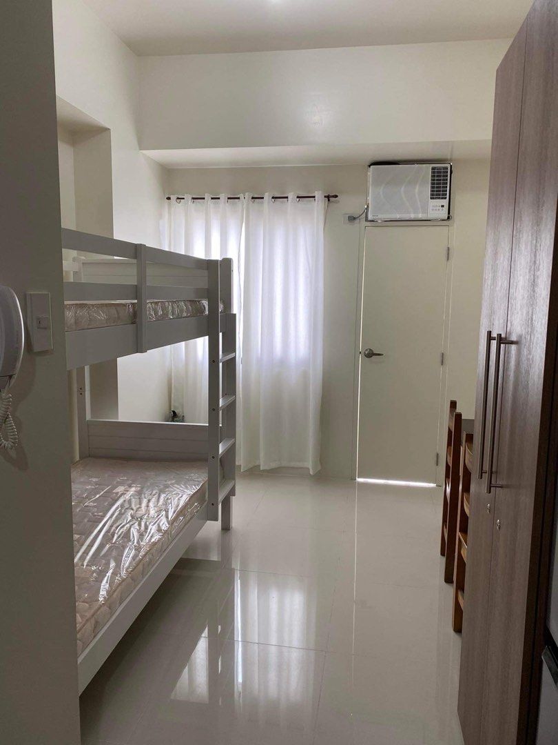 3Torre Lorenzo Studio Unit (Category: Apartments & Condos) located in Makati City. Submitted by future.fits (Listing ID 1049185799, Image 1). Description: UNIT 2118, facing Makati, 21 sqm - Located at P. Ocampo St. Beside De La Salle College of St. Benilde School of Design & Arts, across St. Scholastica's College Manila, and near De La Salle University Manila; ~2KM to Makati Inclusions: - Range Hood - Double deck bed - Washing machine - Ref - Toa