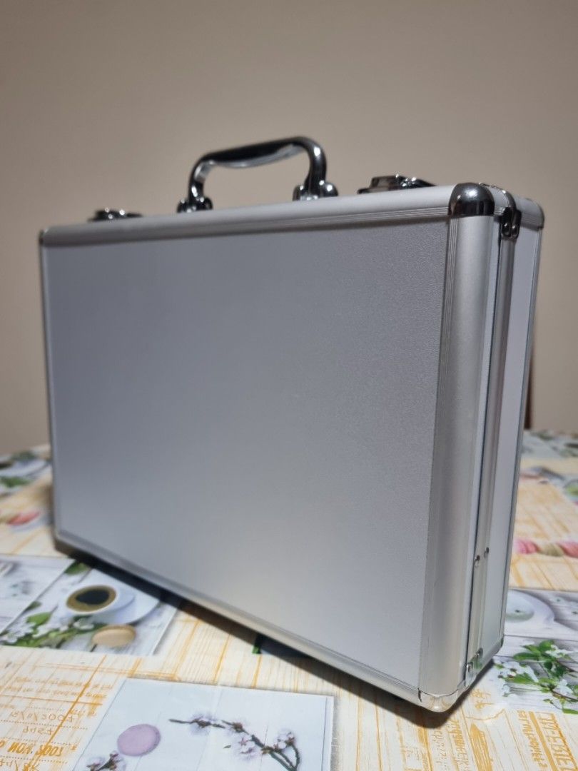 Hard briefcase with lock store