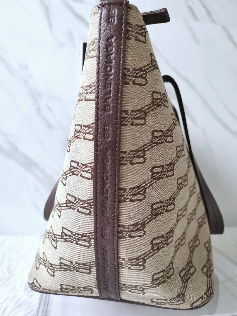 Authentic Balenciaga Vintage Monogram Bag (Category: Luxury Bags & Wallets) located in Makati City. Submitted by _collectorschoice_ (Listing ID 1226986004, Image 3). Description: ° BB clasp shoulder bag ° Monogram BB canvas ° Leather trim & straps ° Silver plated hardware ° Balenciaga embossed on leather trim ° Exterior pocket, interior pocket ° Never used ° Minor washable dirt on canvas (not noticeable) ° MOP: BPI or Unionbank ° Plus shipping fe