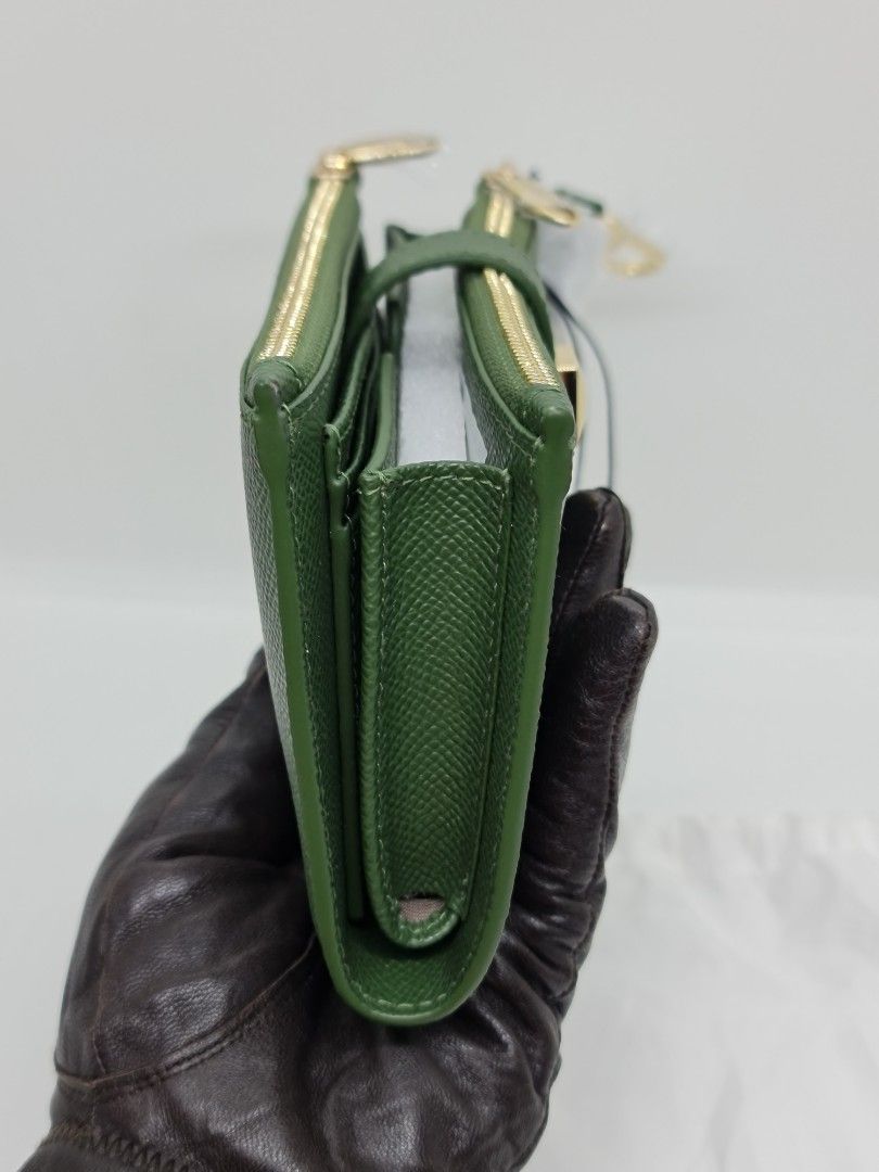 Authentic Furla Wristlet Green (Category: Luxury Bags & Wallets) located in Binan City. Submitted by mommysellsph (Listing ID 1227007441, Image 3). Description: Brand new from UK Has an inner compartment for mobile phones Includes credit card slots.