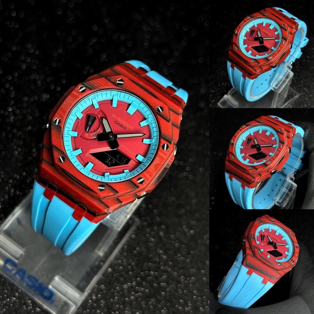 CasiOak Carbon Fiber Series GA 2100 in the latest Carbon Fiber Red Black bezel Red Facedial Handpainted Pastel Blue Chaoter ring and