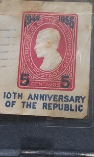Jose rizal embossed stamp 10th anniversary of the republic over print