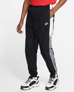 Authentic‼️Nike - Baggy Track Pants, Men's Fashion, Bottoms, Joggers on  Carousell