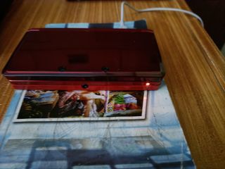 Nintendo 3DS red - w/ charger and Pokemon Bank