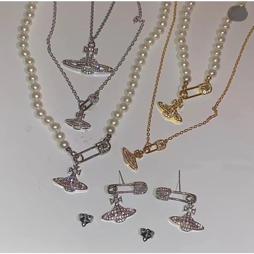 Vivienne westwood gold saturn pearl necklace hot sale