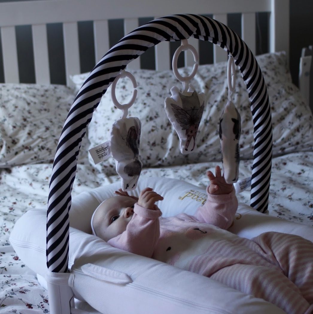 Sleepyhead Deluxe with toy arch Babies Kids Baby Nursery