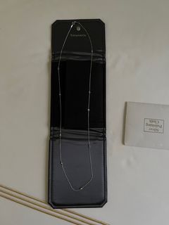 Tiffany and co - diamonds by yard necklace- 9 diamonds set in sterling silver