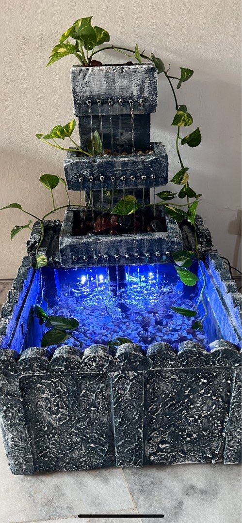 Custom made Styrofoam indoor aquarium with elements of FungShui
