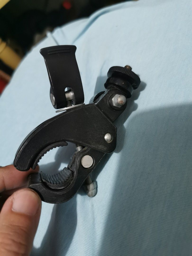 Handlebar clamp bracket for action cam (Category: Bicycles) located in Quezon City. Submitted by snoviee (Listing ID 1227175831, Image 1). Description: Handlebar clamp bracket for action cam quick release screw clamp.