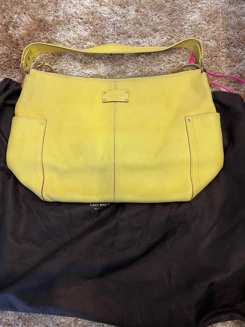 Kate Spade yellow hobo Bag (Category: Luxury Bags & Wallets) located in Taguig. Submitted by bubblystimy (Listing ID 1227086301, Image 1). Description: Authentic complete with dustbag and care card. Please see pictures for issues. Still in very good condition.