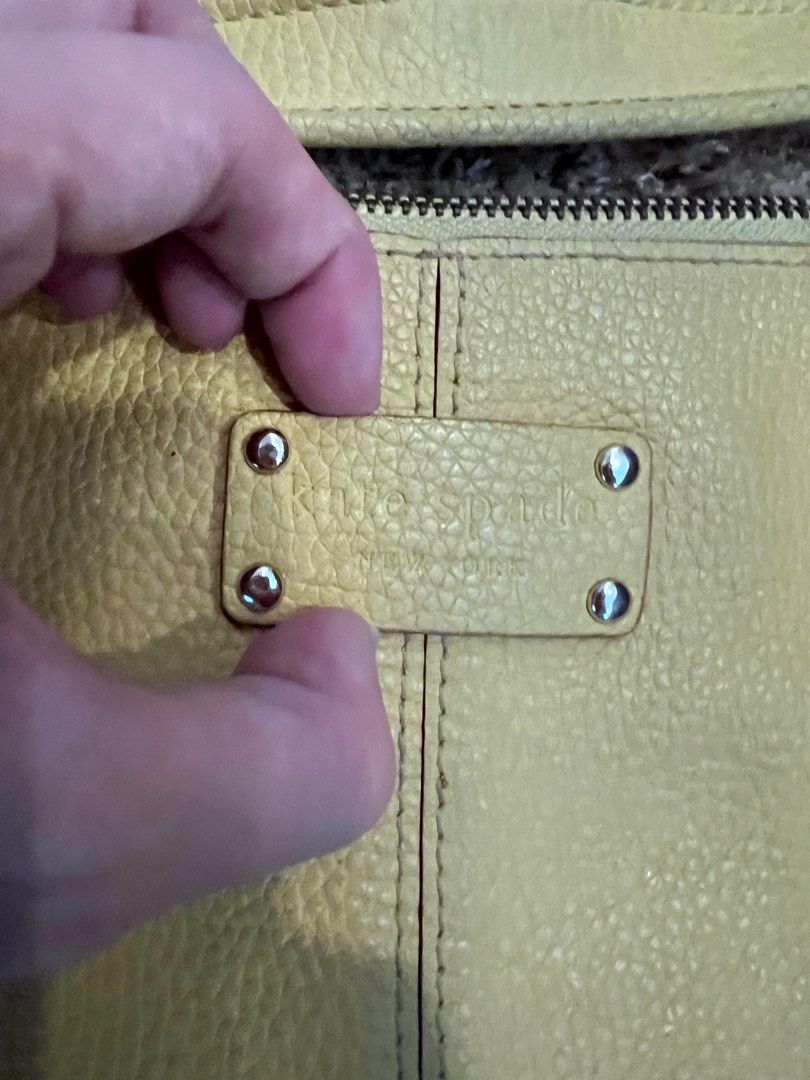Kate Spade yellow hobo Bag (Category: Luxury Bags & Wallets) located in Taguig. Submitted by bubblystimy (Listing ID 1227086301, Image 3). Description: Authentic complete with dustbag and care card. Please see pictures for issues. Still in very good condition.