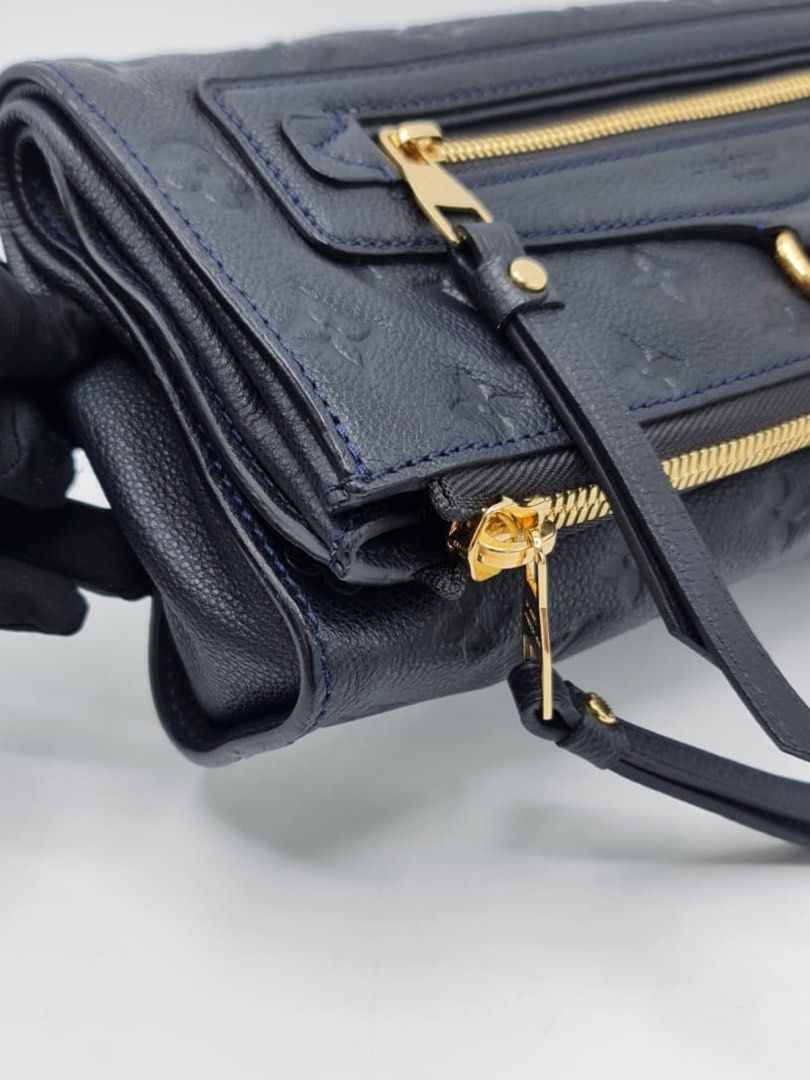 Louis Vuitton Bleu Infini Monogram Empreinte Leather Petillante Clutch  Handbag