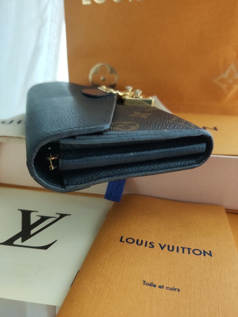 Singapore - SEP 11, 2016: a Louis Vuitton Wallet Standing . Louis Vuitton  is a Luxury Designer Brand. Editorial Photo - Image of object, 2016louis:  86304266