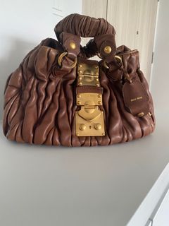 Miu Miu Bow mini bag, Luxury, Bags & Wallets on Carousell