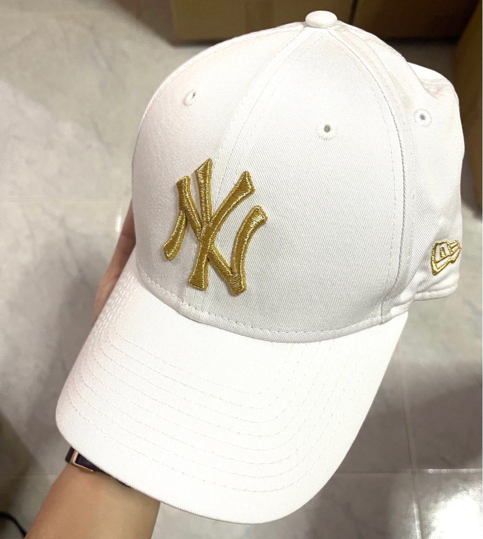 White and 2025 gold yankees hat