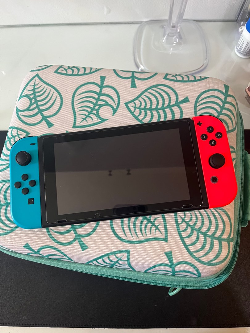 Nintendo Switch Version 2 (+ free Animal Crossing merch) on Carousell