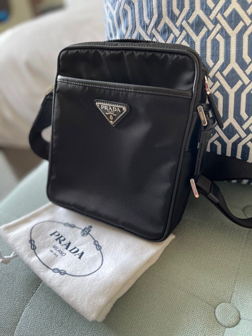 Prada Crossbody Mens Bag (Category: Luxury Bags & Wallets) located in Manila. Submitted by flojo1220 (Listing ID 1227116408, Image 2). Description: On Hand Item Pre owned Authentic Prada Tessuto Bandoliera 2VH112 Crossbody Bag Mint condition No issues whatsoever Php 105,000 Complete inclusions.