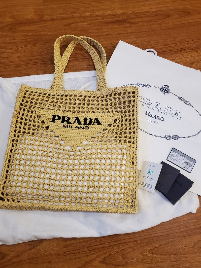 PRADA RAFFIA TOTE BAG (Category: Luxury Bags & Wallets) located in Davao. Submitted by Tineeee. (Listing ID 1227210269, Image 1). Description: in beige color ❤️.