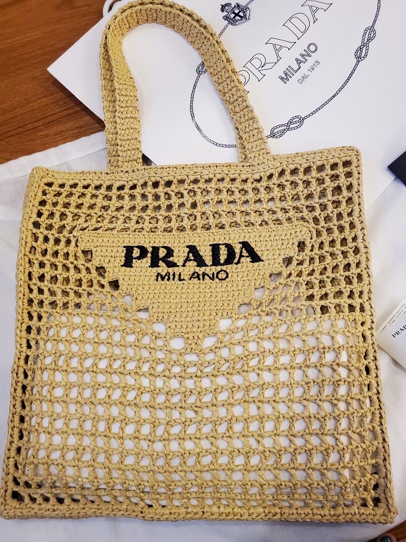 PRADA RAFFIA TOTE BAG (Category: Luxury Bags & Wallets) located in Davao. Submitted by Tineeee. (Listing ID 1227210269, Image 2). Description: in beige color ❤️.