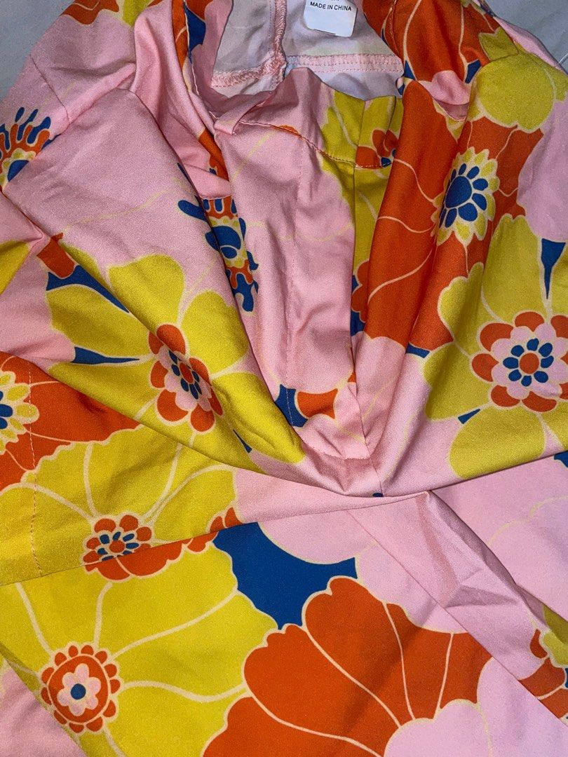 Shein Floral Pants (Category: Other Bottoms) located in Makati City. Submitted by bilzer (Listing ID 1227234870, Image 3). Description: Harry Styles-core Flare pants Zara dupe I am waistline 26 Altered to fit 5’0-5’3 height Material is polyester Nice on the butt 😂 .