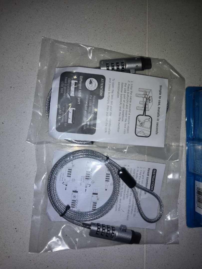 Computer lock (Category: Other Accessories) located in Singapore. Submitted by spor1 (Listing ID 1227362281, Image 1). Description: Letting go newly computer lock. Didn't have the chance to lock it..