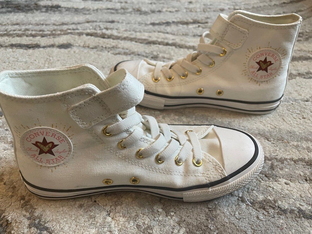 black converse with heart