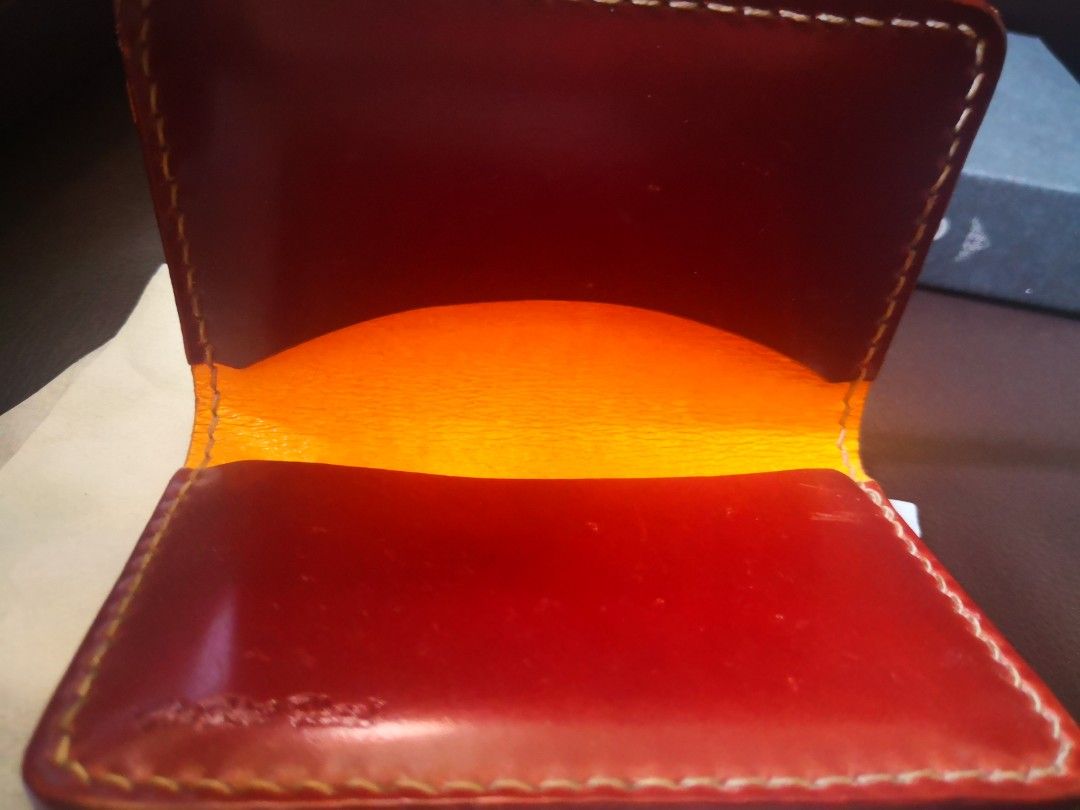 Flat Head Cordovan Card Case (Made In Japan) (Category: Wallets & Card Holders) located in Muntinlupa City. Submitted by silent_mute (Listing ID 1227341919, Image 3). Description: https://www.selfedge.com/wallets?product_id=222&filter=51#collapseOne Tan Cordovan Leather w/ Light Orange Pigskin Interior Hand Sewn Waxed Cow Tendon Thread 4.75" Length (closed) 3" Width (closed) BPI/BDO/Gcash.
