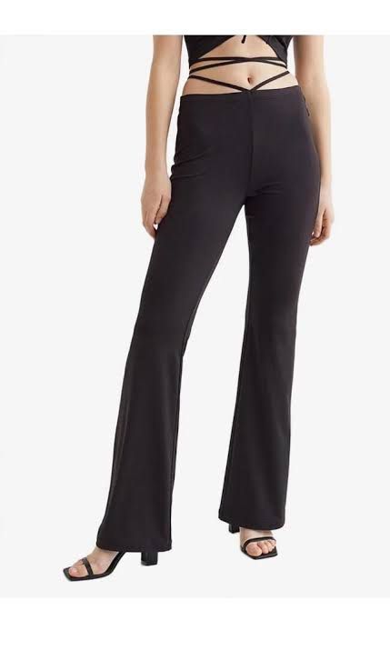 H&M Black Trouser with Wrap detail (Category: Other Bottoms) located in Makati City. Submitted by imryzz (Listing ID 1227387262, Image 2). Description: H&M flare trouser with wrap details Cotton Small size Fr website: Flared pants in woven stretch fabric with a regular waist. Waistband with covered elastic and long, extra-narrow ties. CompositionPolyester 95%, Spandex 5% Art. No.0972398005 Link: https://www2.hm.com/en_us/productpage.0972398005.ht