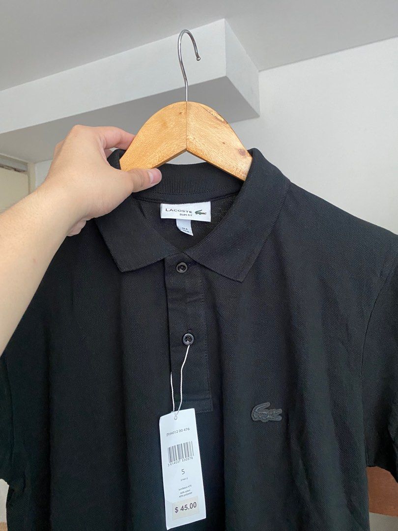 Lacoste Poloshirt Medium (Category: Tshirts & Polo Shirts ) located in Manila. Submitted by keepitminimal (Listing ID 1227275114, Image 1). Description: Selling at cost. Bought online. NGA. Hence, the price. Logo is superb. Fabric is good enough..