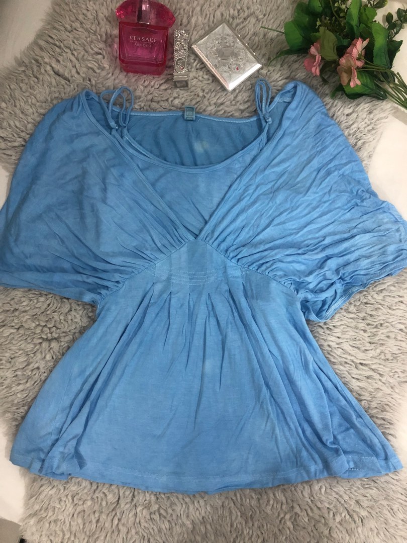 Light blue butterfly top on Carousell