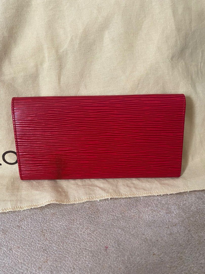 LV Red Epi Bifold Long Wallet (Category: Luxury Bags & Wallets) located in Bulacan. Submitted by thedeclutteringmom (Listing ID 1227331935, Image 2). Description: Guaranteed original Money back guaranteed if proven fake In very good condition Like new inside Color is still bright and like new Slim and light wallet No sticky part Flap closure With minimal stain at the back thus selling low (unnoticeable in actual) does not affect the beauty of the