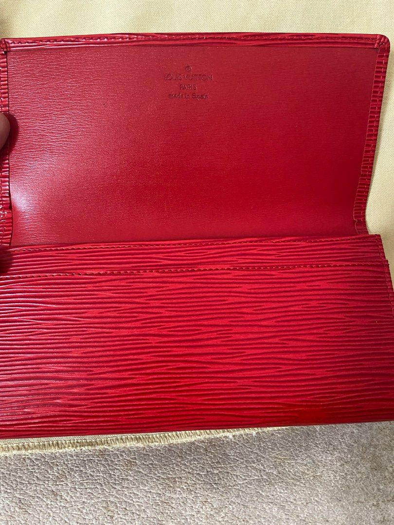 LV Red Epi Bifold Long Wallet (Category: Luxury Bags & Wallets) located in Bulacan. Submitted by thedeclutteringmom (Listing ID 1227331935, Image 3). Description: Guaranteed original Money back guaranteed if proven fake In very good condition Like new inside Color is still bright and like new Slim and light wallet No sticky part Flap closure With minimal stain at the back thus selling low (unnoticeable in actual) does not affect the beauty of the