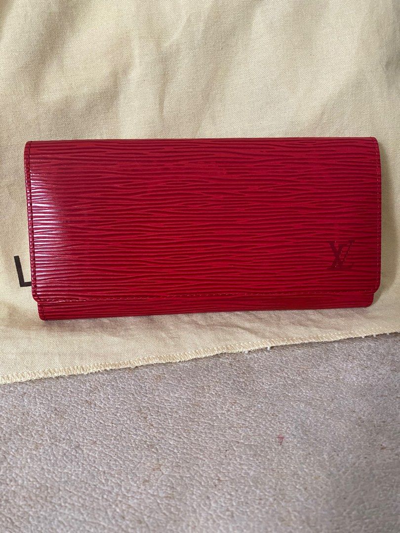 LV Red Epi Bifold Long Wallet (Category: Luxury Bags & Wallets) located in Bulacan. Submitted by thedeclutteringmom (Listing ID 1227331935, Image 1). Description: Guaranteed original Money back guaranteed if proven fake In very good condition Like new inside Color is still bright and like new Slim and light wallet No sticky part Flap closure With minimal stain at the back thus selling low (unnoticeable in actual) does not affect the beauty of the