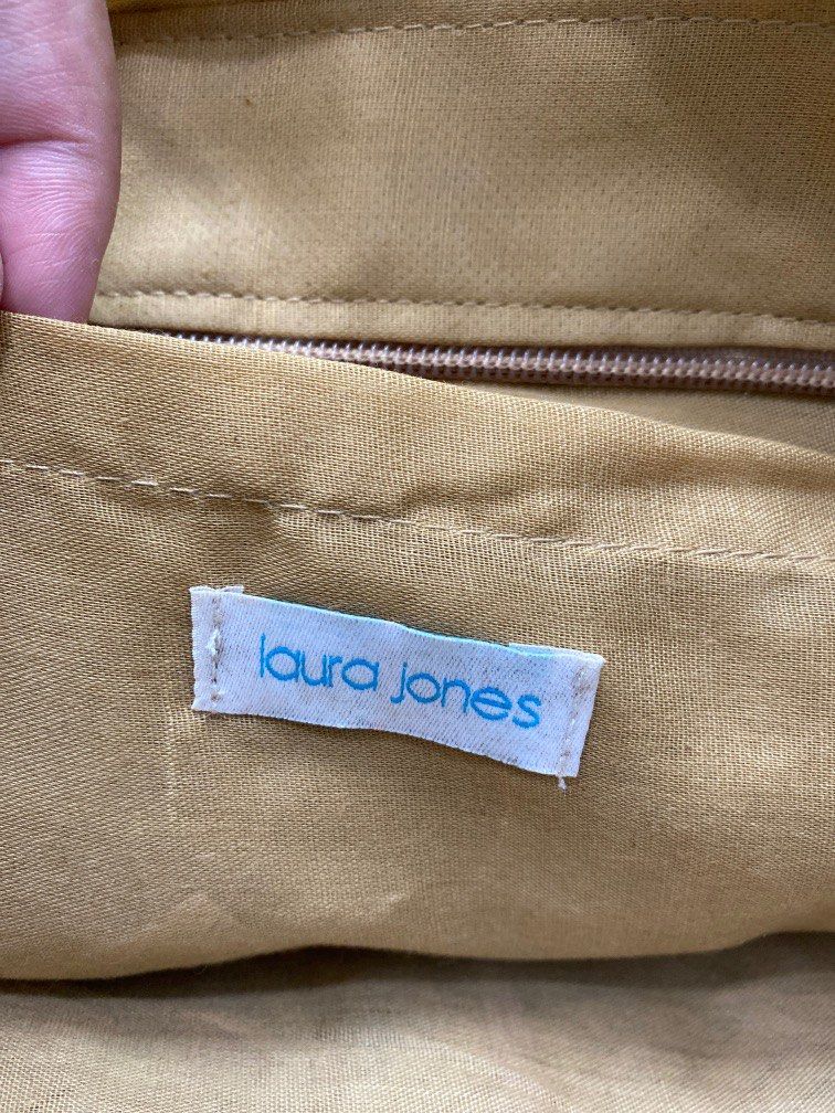 Laura jones straw 2025 bags