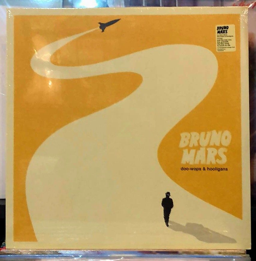 BRUNO MARS: DOO-WOPS & HOOLIGANS - 10TH ANNIVERSARY EDITON [ORANGE VINYL/LP] (Category: Vinyls) located in Rizal. Submitted by cd_red_shop (Listing ID 1227426863, Image 1). Description: 📌BRUNO MARS: DOO-WOPS & HOOLIGANS - 10TH ANNIVERSARY EDITON [ORANGE VINYL/LP] Multiple Grammy Award winner Bruno Mars' debut album Doo-Wops & Hooligans was released in October 2010 and named "the year's finest pop debut: 10 near-perfect songs," by Rolling Stone. 