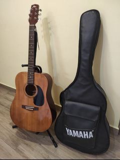 Acoustic guitar with  bag & stand