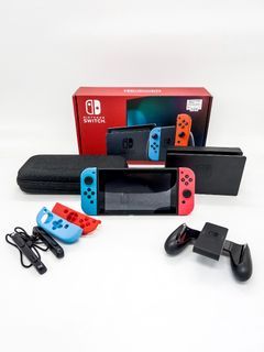 Nintendo Switch V2 (with 4 games & 128gb Sandisk SD card)