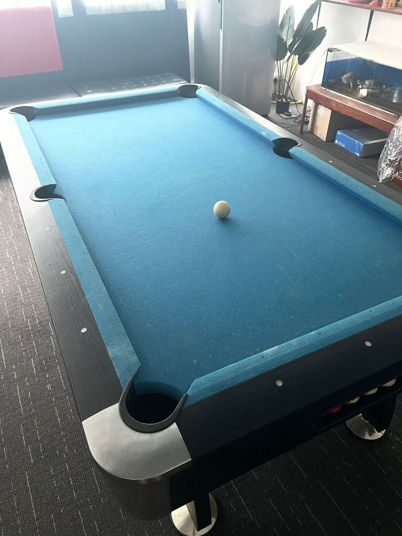 Pool Table (Category: Other Sports Equipment and Supplies) located in Singapore. Submitted by kliff_ho (Listing ID 1227478905, Image 2). Description: Selling second-hand table for $200 Still in good working condition Delivery +$50 includes: 1 x pool table 1 x 1 + 15 balls 1 x ball rack 3 x cue stick 1 x cue stick stand.