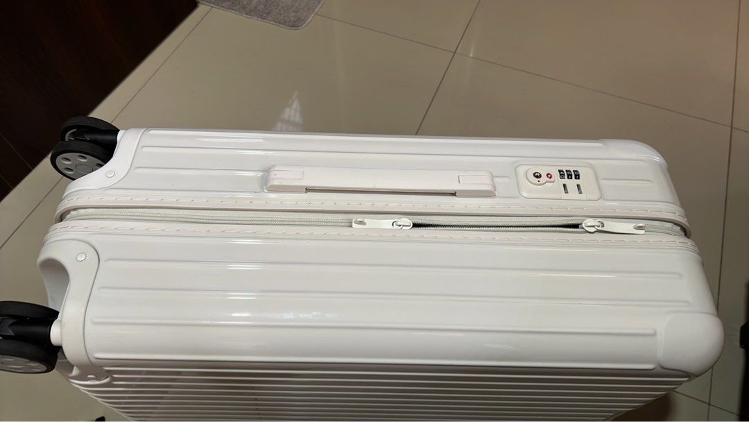 Rimowa luggage in medium (Category: Luggage) located in Antipolo. Submitted by chellai12 (Listing ID 1227497465, Image 2). Description: Authentic and slightly used in white with codver Polycarbonate Actual photos posted Mop: bdo / gcash .