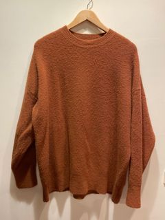 橘紅色毛衣