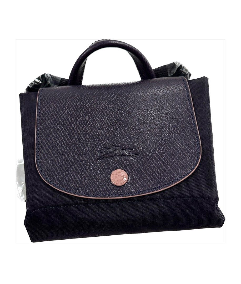 Longchamp le pliage club backpack best sale review