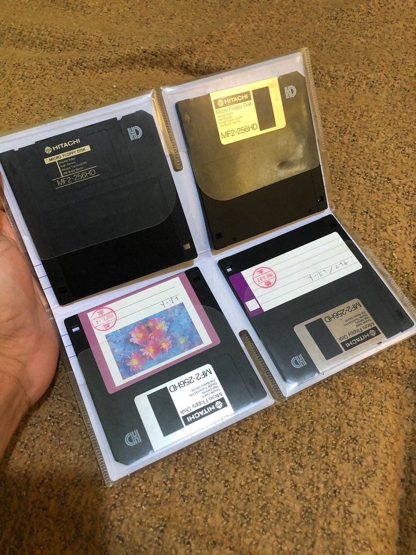 Floppy disk holder with old floppy disks 4pcs on Carousell